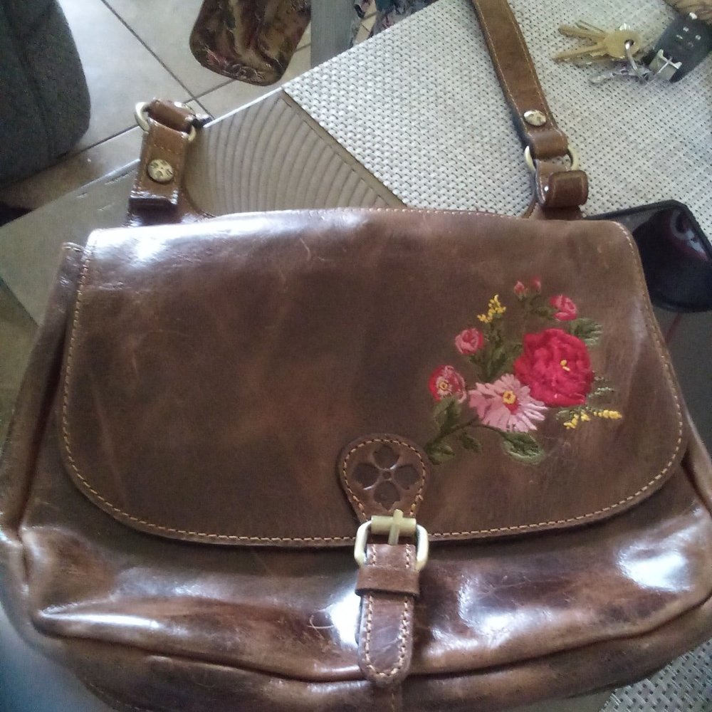 Patricia Nash cross body leather bag with pink and rec embroidered flowers